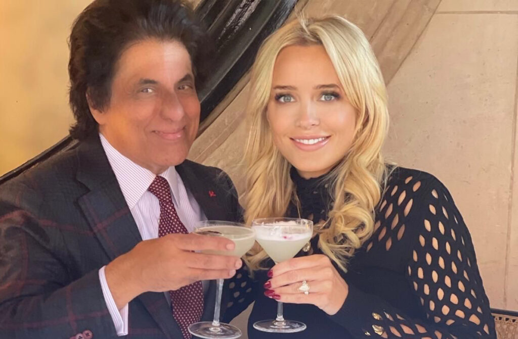 With his wife, Isabelle. 